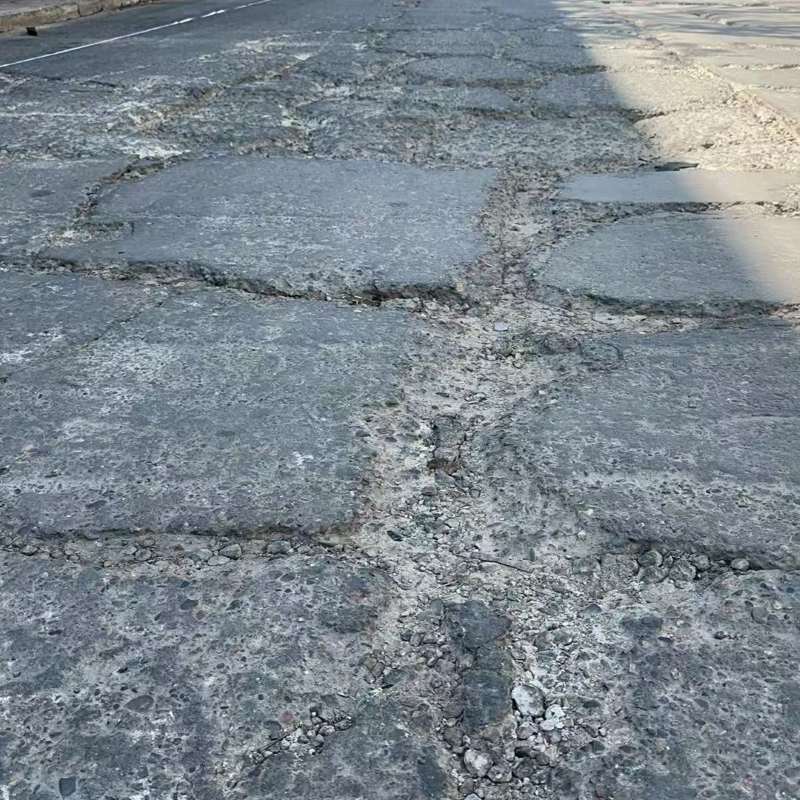 黄龙路面起砂露石子修补料